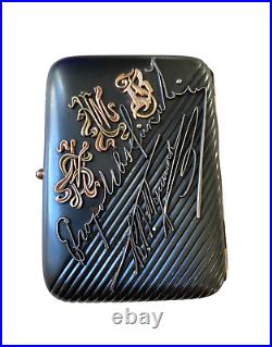 A Faberge Gold and Gunmetal Cigarette Case, St. Petersburg, 1908-1917