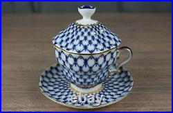 Lomonosov Imperial Russian porcelain covered cup & saucer blue net, gold trim